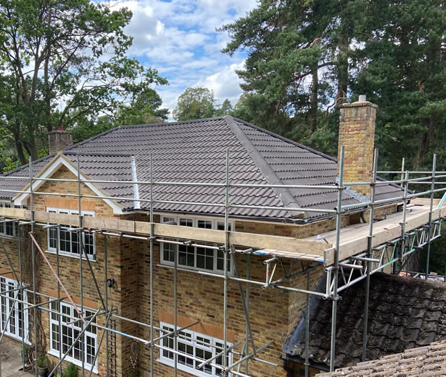 Traditional pitched roof and chimney in Oxfordshire